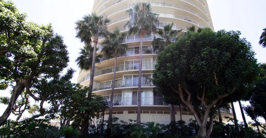 The three hundred sixty degree International Tower building is wrapped with balconies