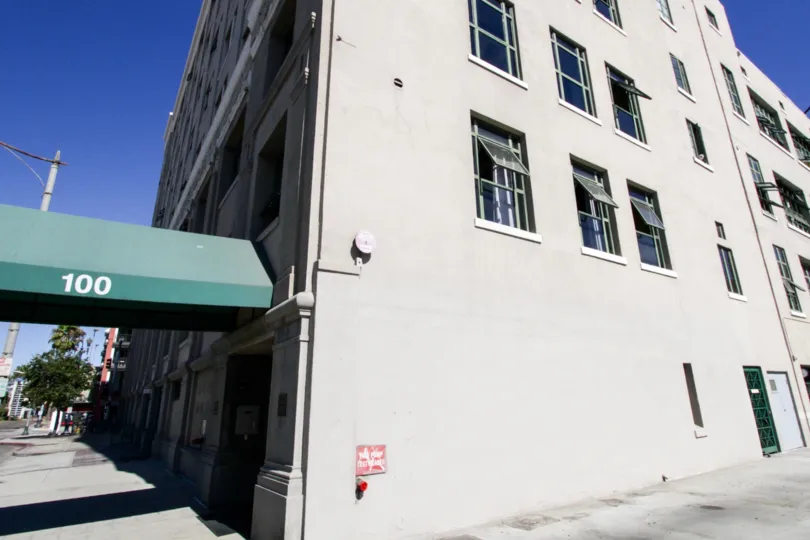 A canopy extends from the entry of Kress Lofts to the street