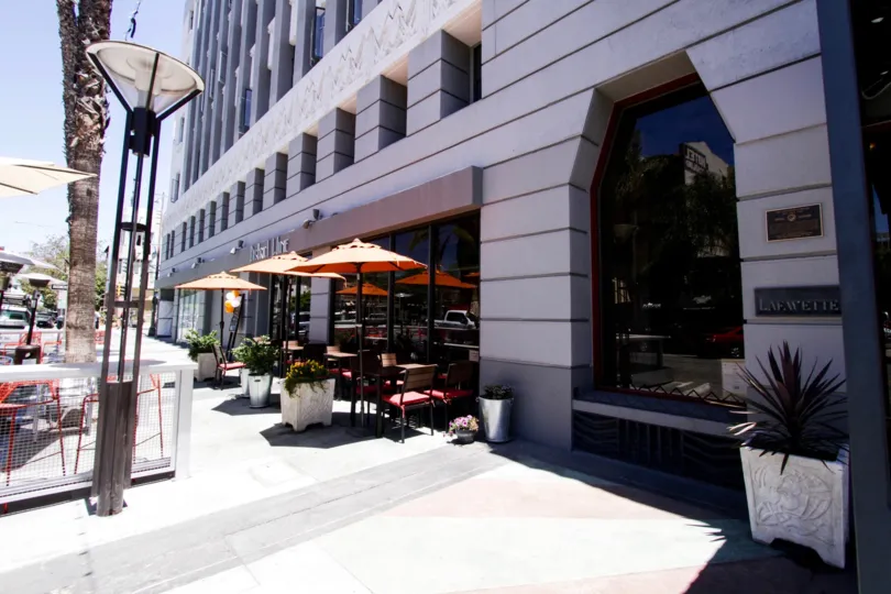 A café sits at the ground floor of the Lafayette Building