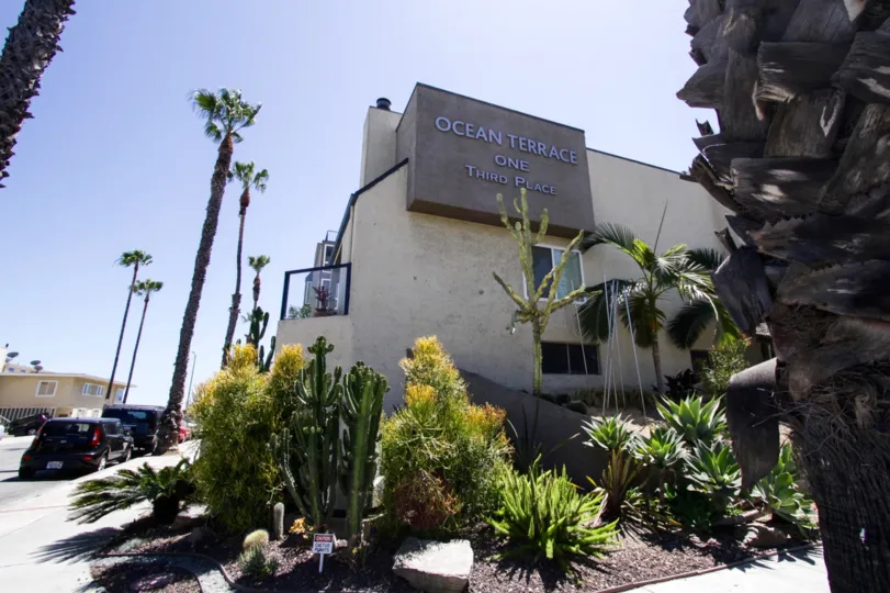 View of the side of the Ocean Terrace building and landscaped planters