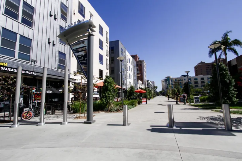 A large walkway leads down the way in front of Promenade Walk