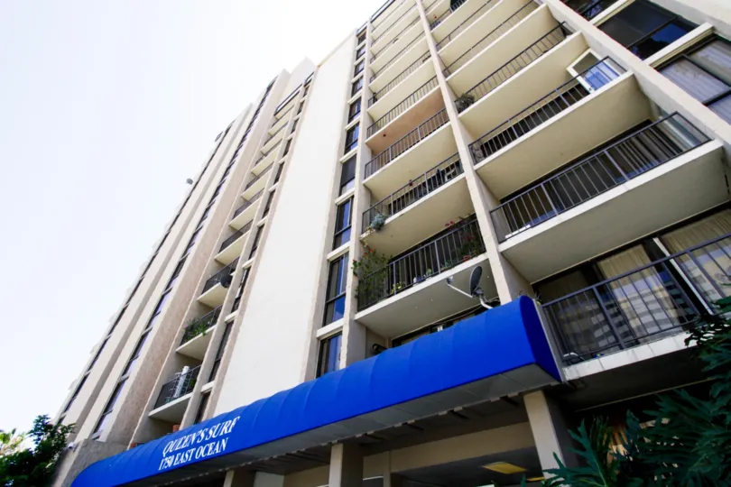 Balconies line the front of the Queens Surf building