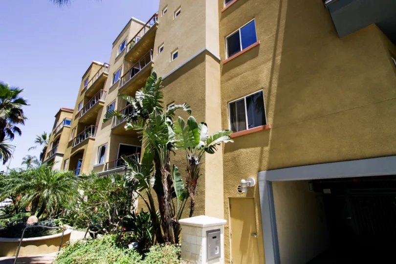Lushly landscaped planters surround The Meridian
