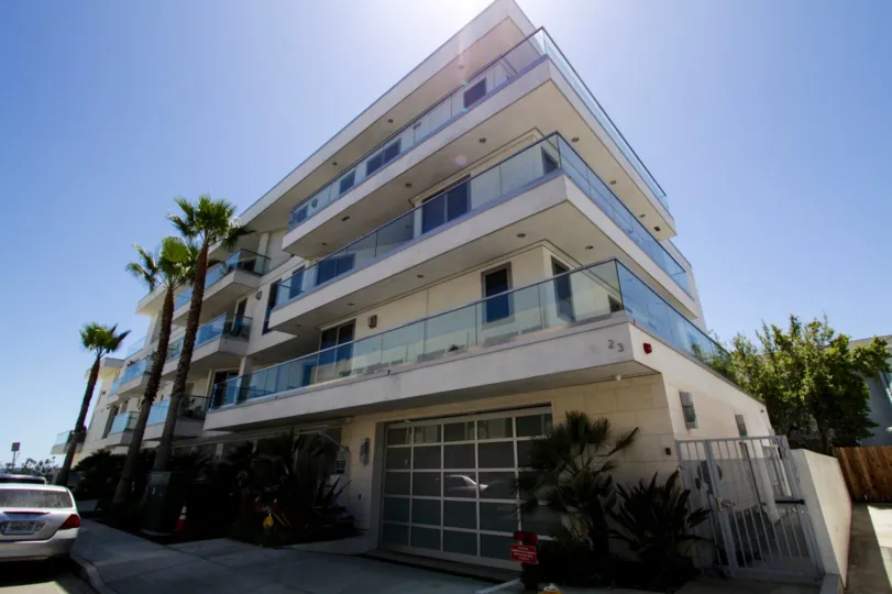 The Oceanside is a modern condo building with ocean views
