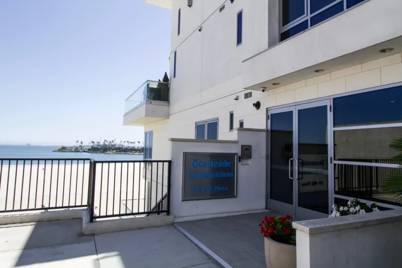 Entrance to The Oceanside with ocean view in background