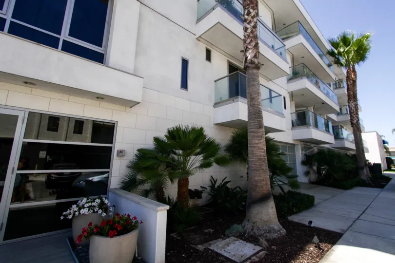 Sidewalk and planters in front of The Oceanside condos