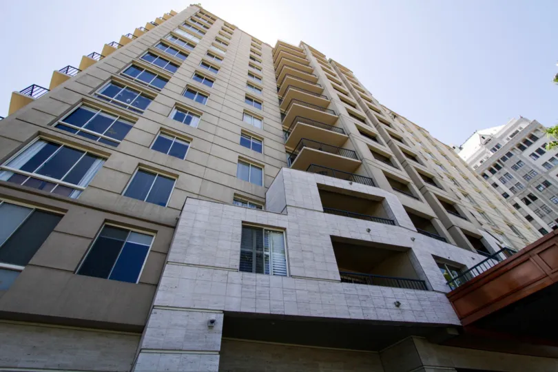 Balconies extend up to the top of The Pacific condo building