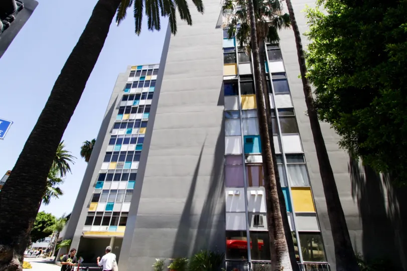 Blue, yellow and white accents on the sides of The Royal Palms