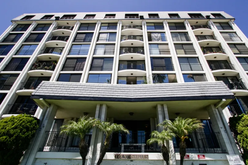 Rounded balconies extend from The Versailles Condos