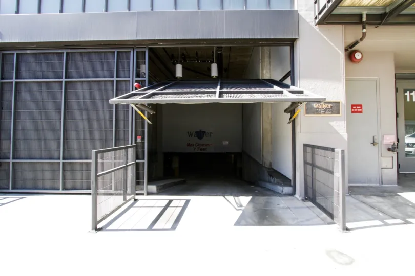Gated subterranean garage entrance to Walker Building Lofts