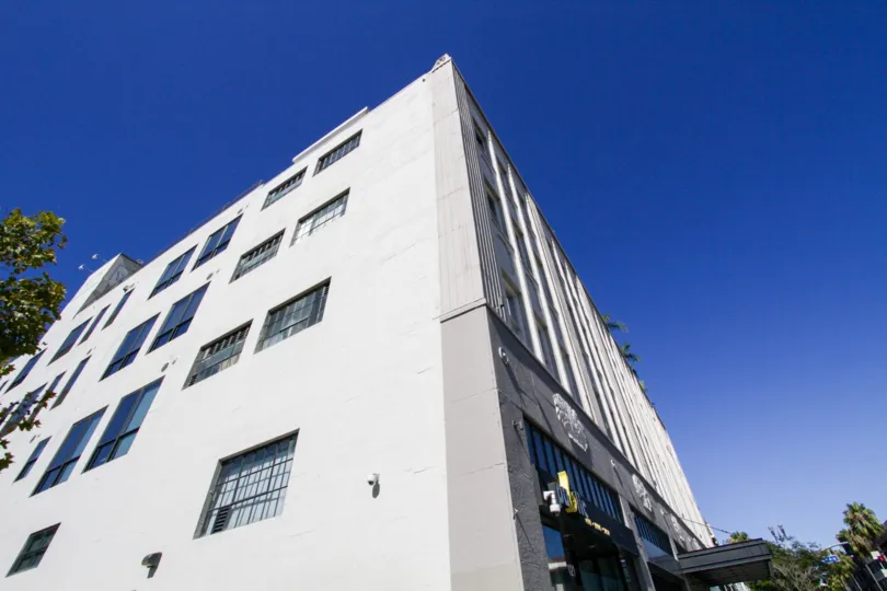 Side view of the concrete Walker Building Lofts building