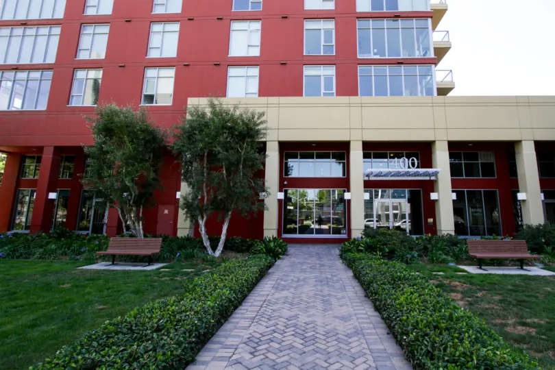 Paver stones lead to the West Ocean Towers entrance