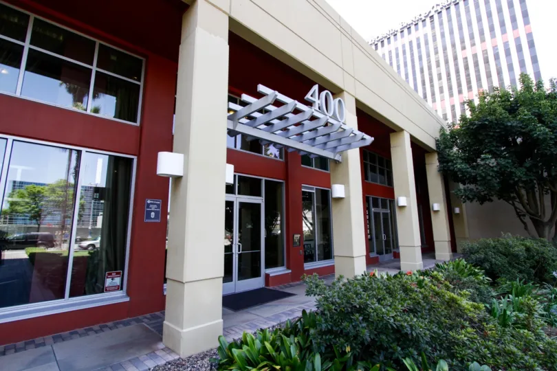 Large numbers stand atop the awning above the West Ocean Towers entry