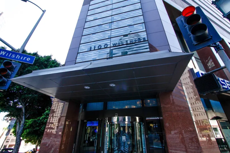 The address seen above the entrance of 1000 Wilshire
