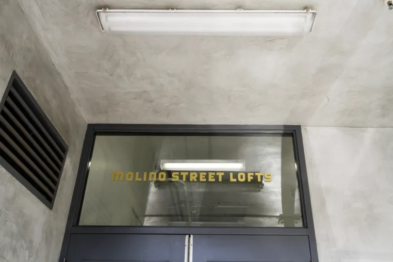 The name of Molino Street Lofts written above the door
