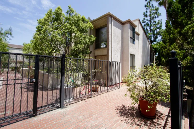 The gated common area for the building at 17711 Margate St