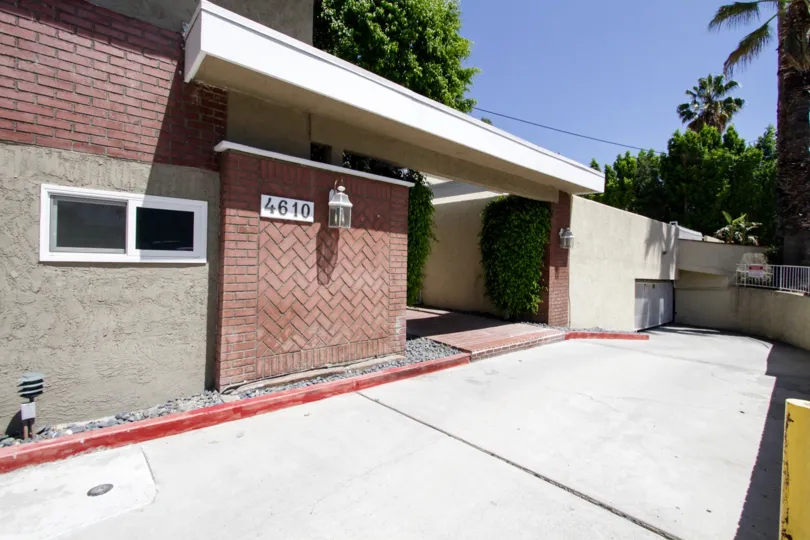 The gently sloping parking garage at 4610 Densmore Ave