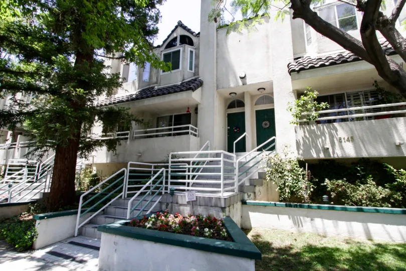 An overview of the 5145 Yarmouth Ave building from the street