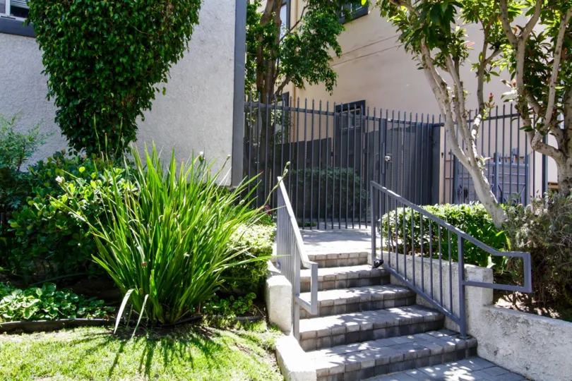 The walkway of 5230 Zelzah Ave among the landscaping in Encino