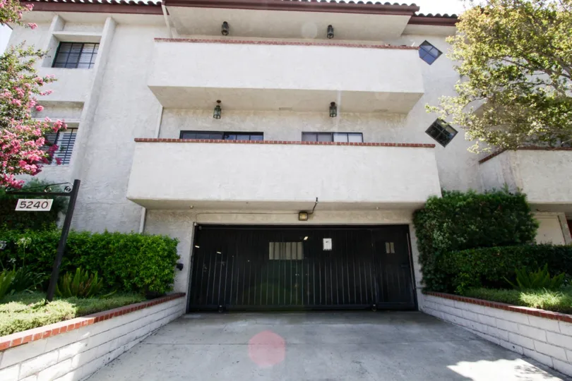 The private parking for 5240 Zelzah Ave