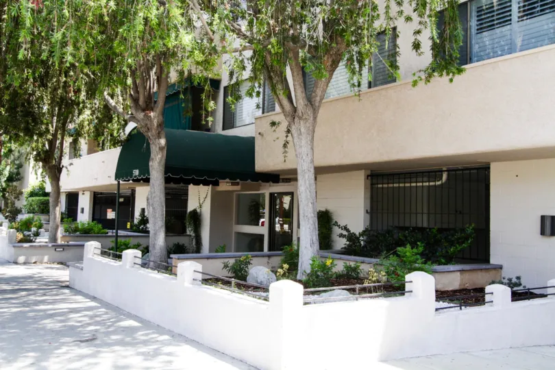 The covered entrance into the Encino Racquet Club