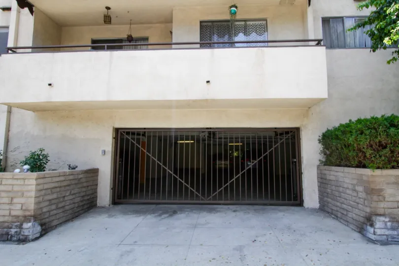 The gated parking area for the Encino Regency building
