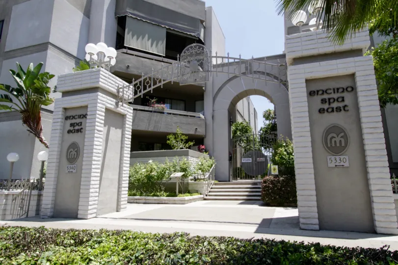 The stone pillars welcoming bypassers to the Encino Spa East in Encino