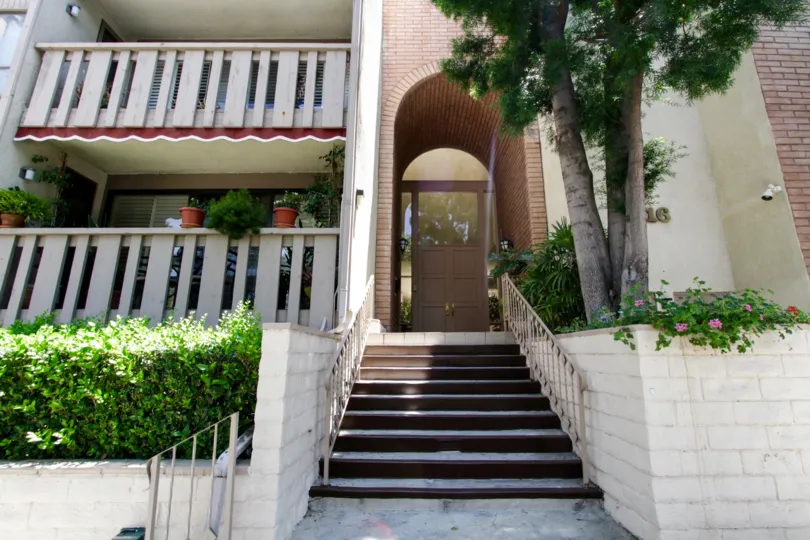 The arched, brick entrance into Encino Spa South