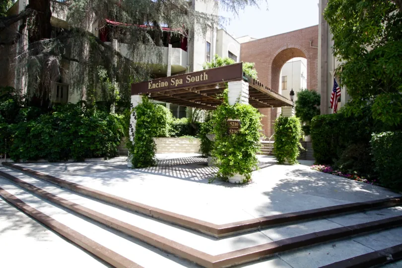 The detailed landscaping welcoming people to Encino Spa South in Encino