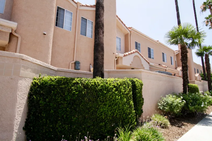 The minimal landscaping outside of the Four Oaks property