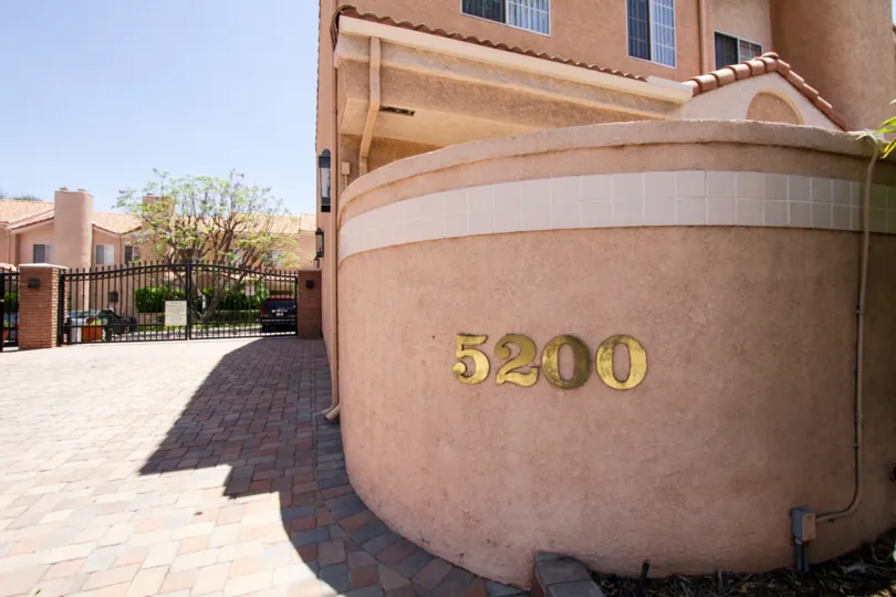The numbered address prominently displayed at Four Oaks in Encino