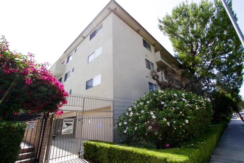The gated side entrance to Ports of Call Condominiums