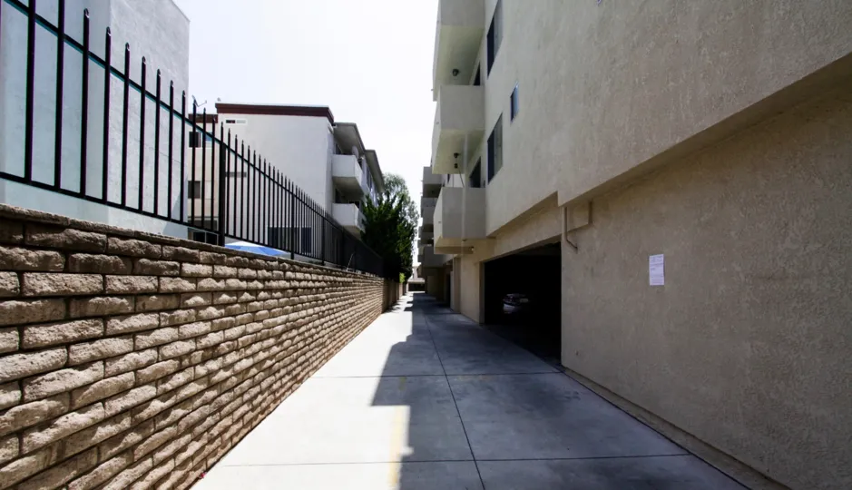 The breezeway between Ports of Call Condominiums buildings