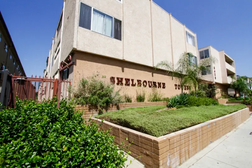 The landscaping beside the sign announcing Shelbourne Towers in Encino
