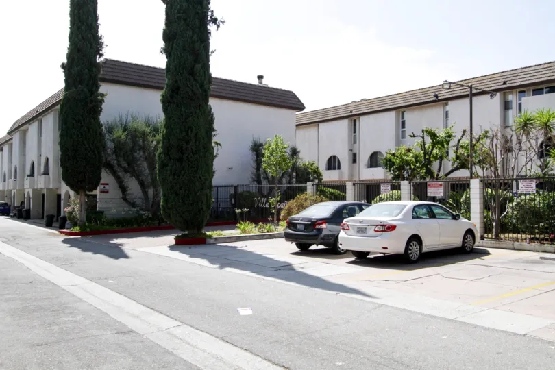 Designated parking spots in the lot of Villa Espana