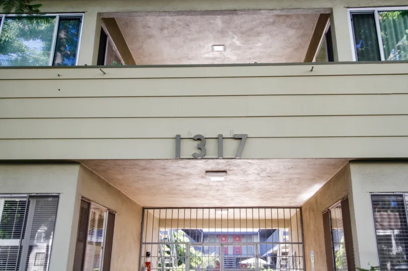 The address above the entrance at 1317 N Brand Blvd