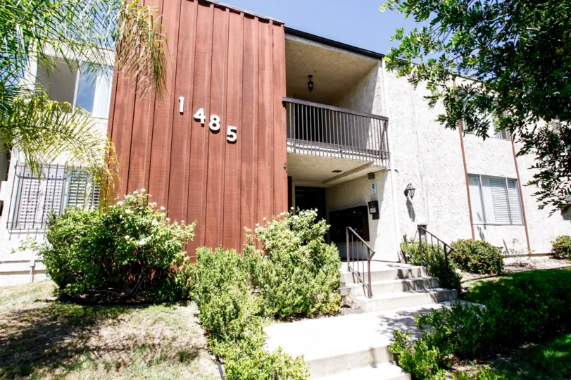 The address on the building at 1485 E Wilson Ave