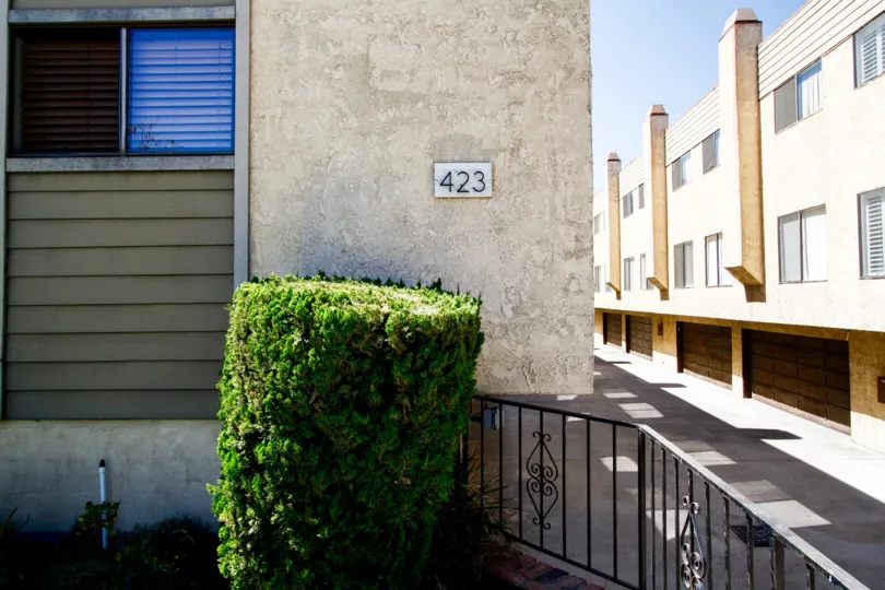 The address on the building at 423 Thompson Ave
