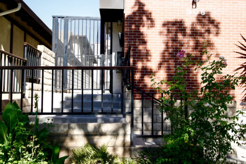 The gate into 506 N Kenwood St