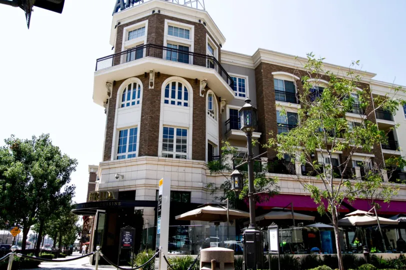 The patios out in front of Excelsior at Americana