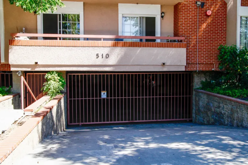 The address above the parking garage at Justin Villas
