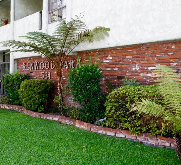 The entry wall seen at Kenwood Park with the name and address