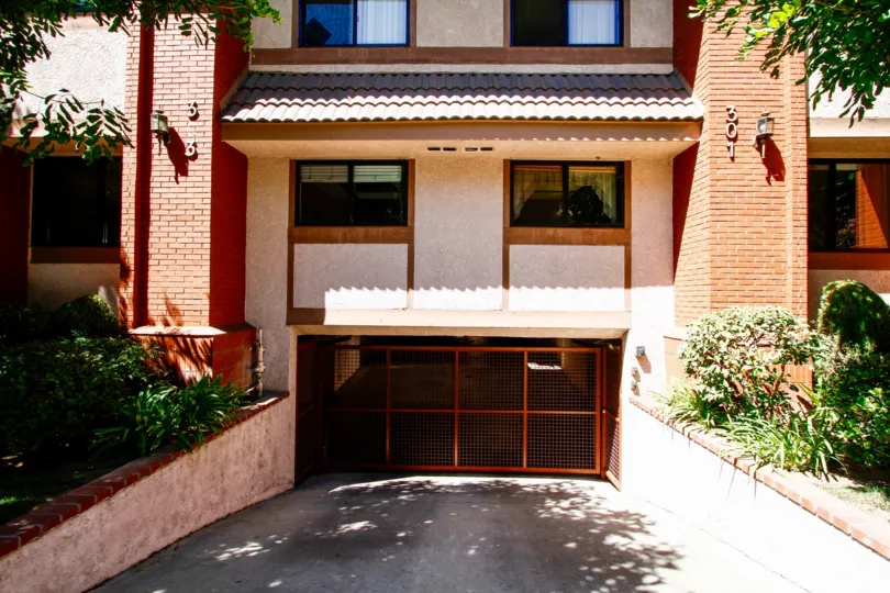 The gate into parking at Loraine Townhomes