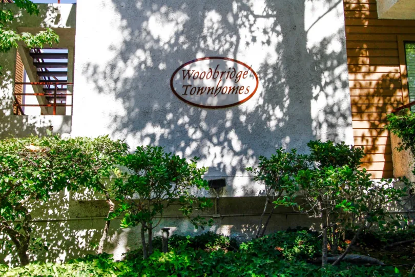 The Woodbridge Townhomes name on the building