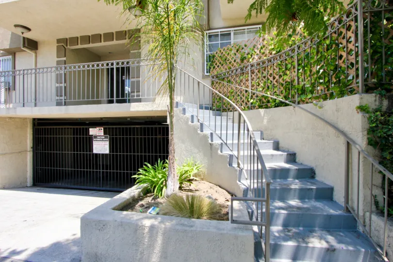 A clear day in the Gramercy Place Townhomes with a staircase of an apartment.