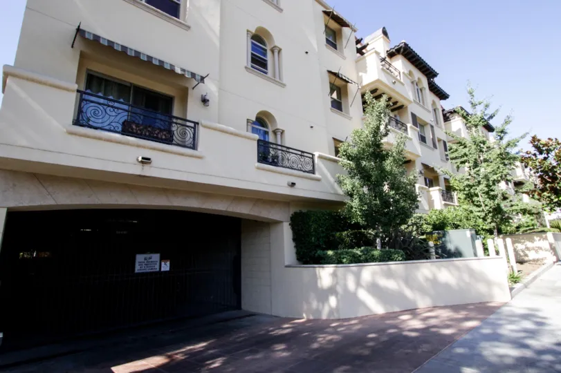 The driveway into the parking for Rosewood Villas