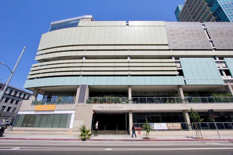 The sleek, sun-soaked modern exterior of the Solair building in Hancock Park, California