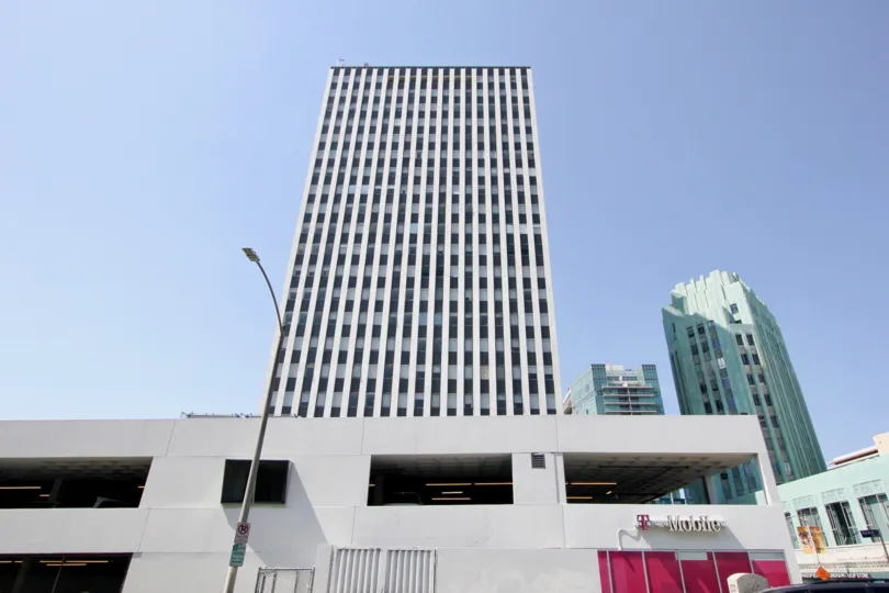 The The Mercury is standing tall with many windows and name printed in front side