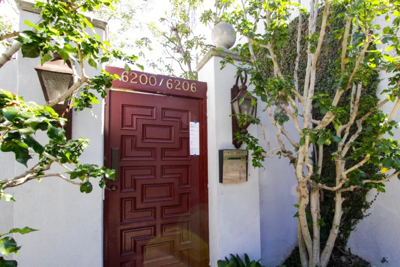 A call box is at the rightside of the Banner Manor Entry door
