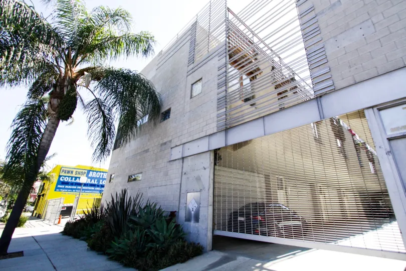 A gated entry leads to private garages and parking at Cahuenga Lofts